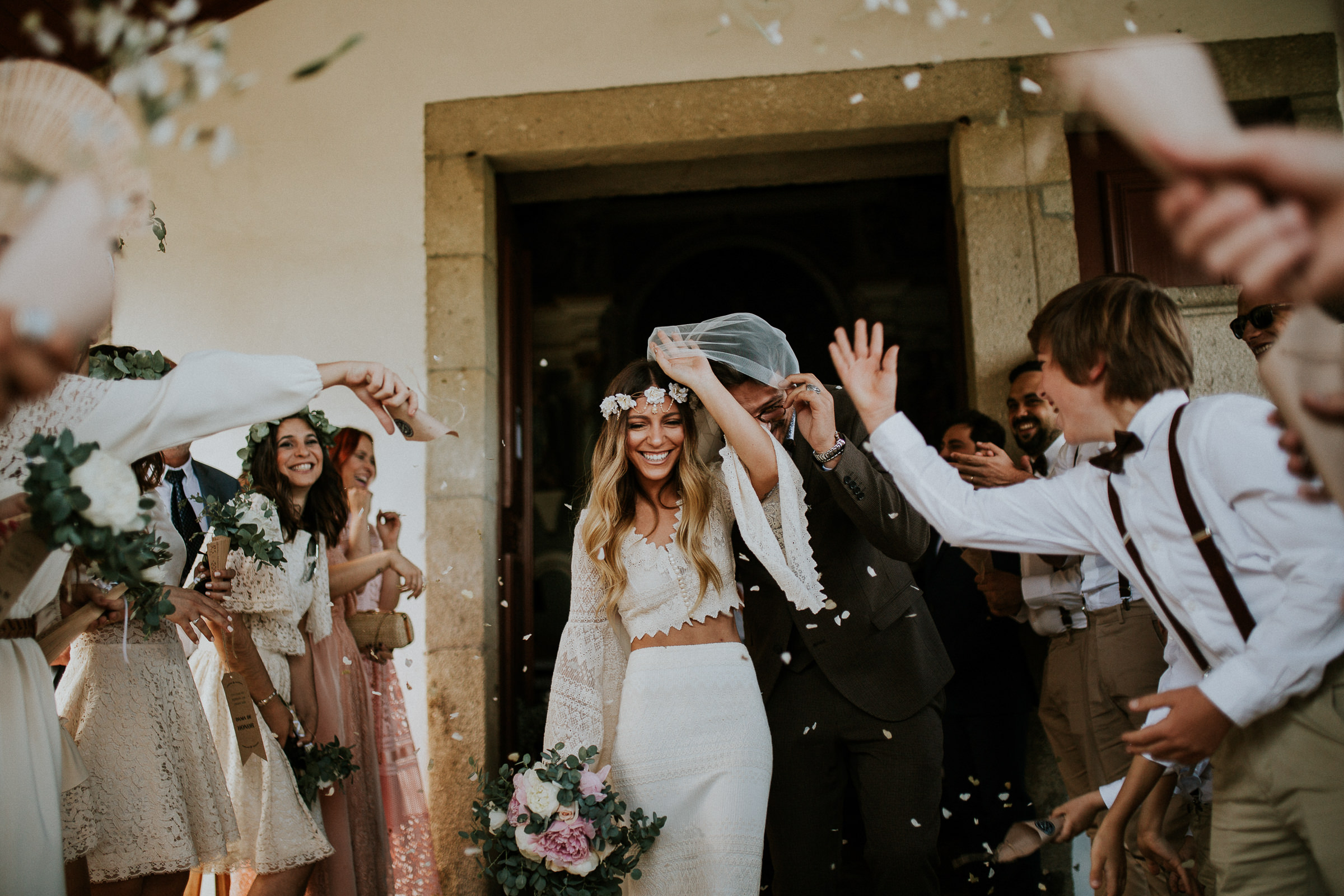 boho chic bride and groom smilling happy after the ceremony